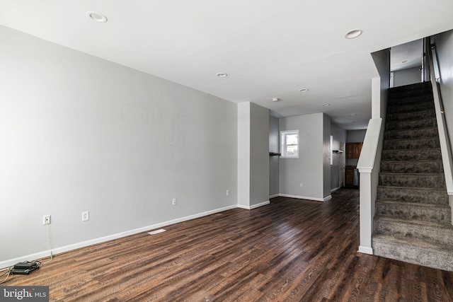 interior space with dark hardwood / wood-style flooring