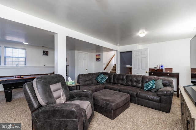 living room with billiards and light colored carpet