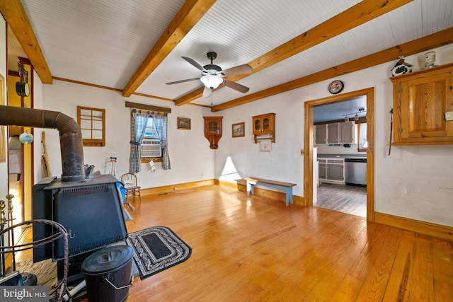 exercise area with hardwood / wood-style flooring, ceiling fan, and cooling unit