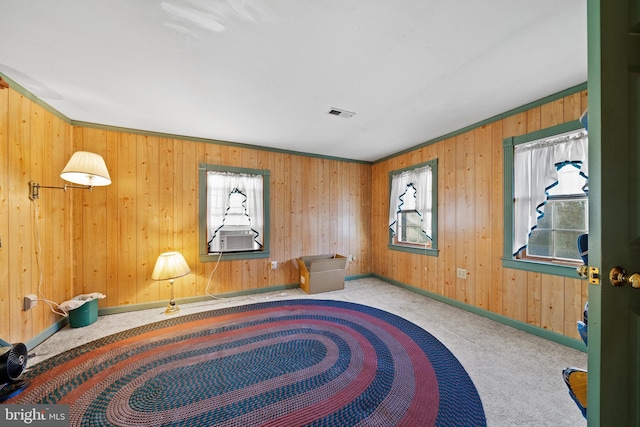 sitting room featuring light carpet