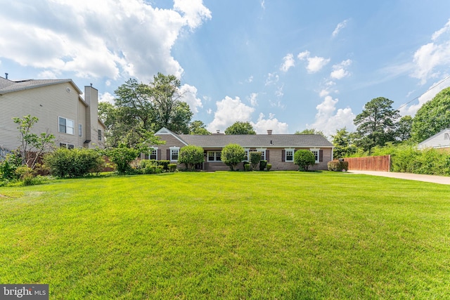 exterior space featuring a front lawn