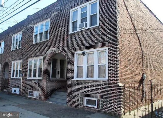 view of home's exterior with cooling unit