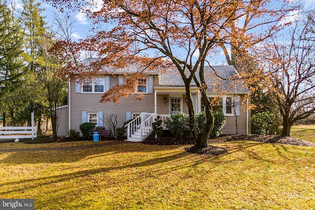 split level home with a front yard