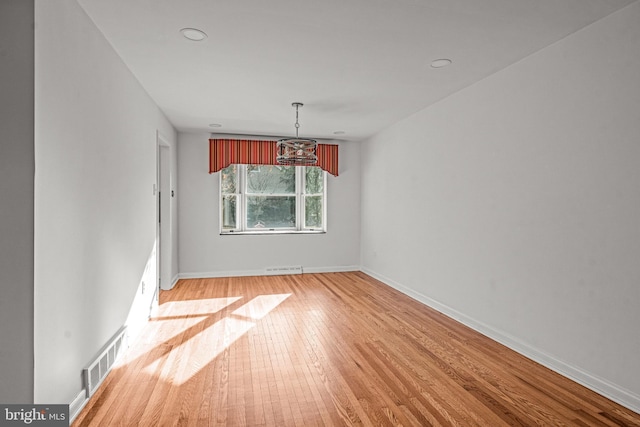 unfurnished dining area featuring light hardwood / wood-style floors