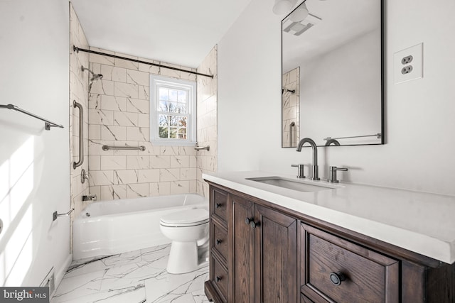 full bathroom featuring vanity, toilet, and tiled shower / bath combo