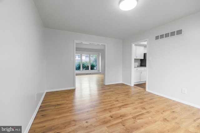 empty room featuring light hardwood / wood-style flooring