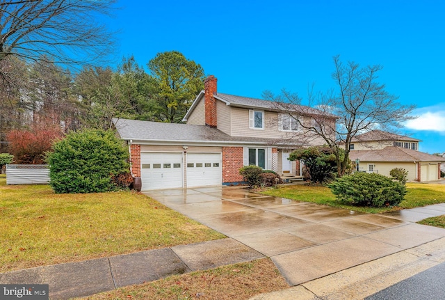 view of front of house featuring a front yard and a garage