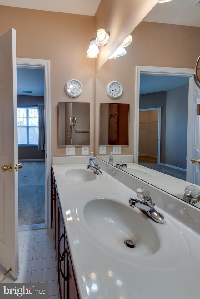 bathroom with vanity and tile patterned floors