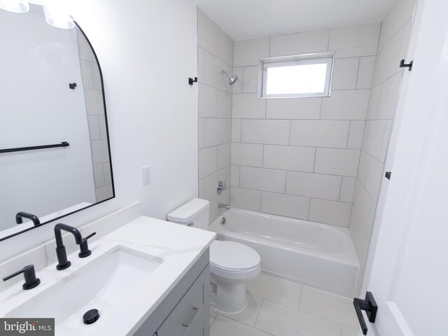 bathroom featuring toilet, shower / bath combination, tile patterned floors, and vanity