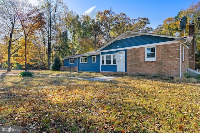 exterior space with a lawn