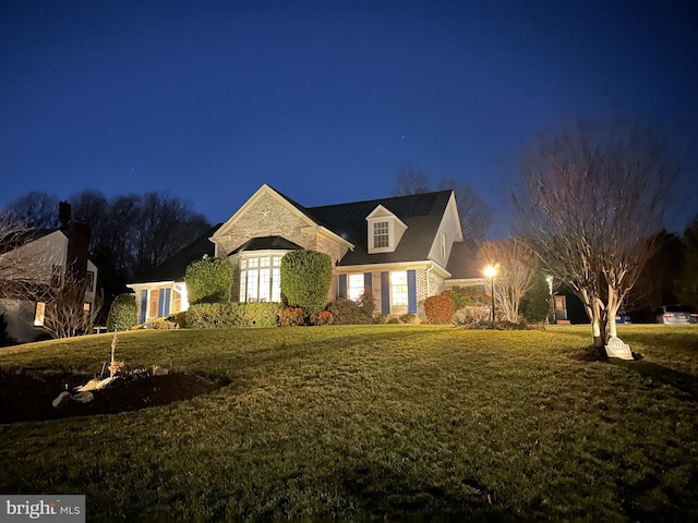 view of front of home featuring a yard