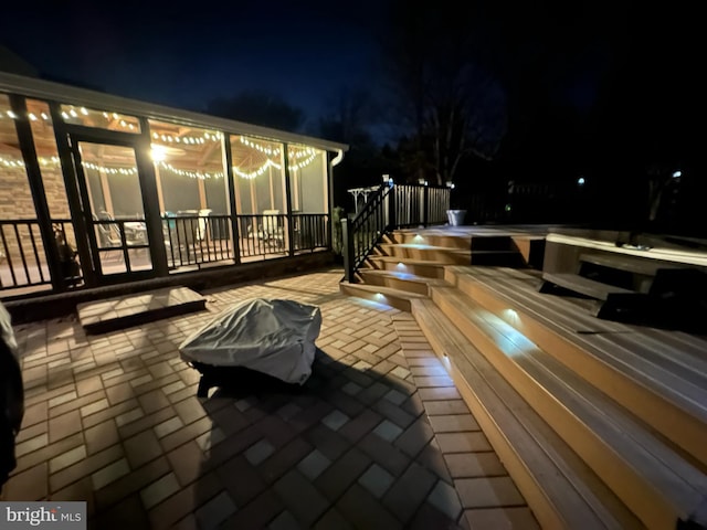 view of patio at twilight