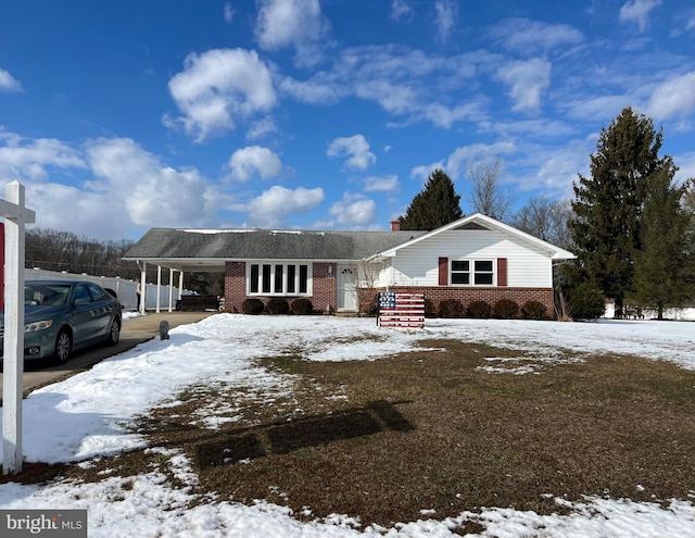 view of front of home featuring a carport