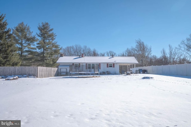 view of snow covered property