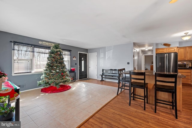 dining room with light tile patterned floors