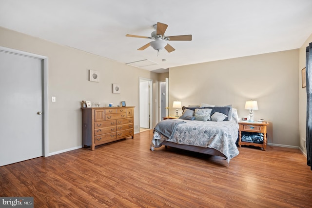 bedroom featuring hardwood / wood-style floors and ceiling fan