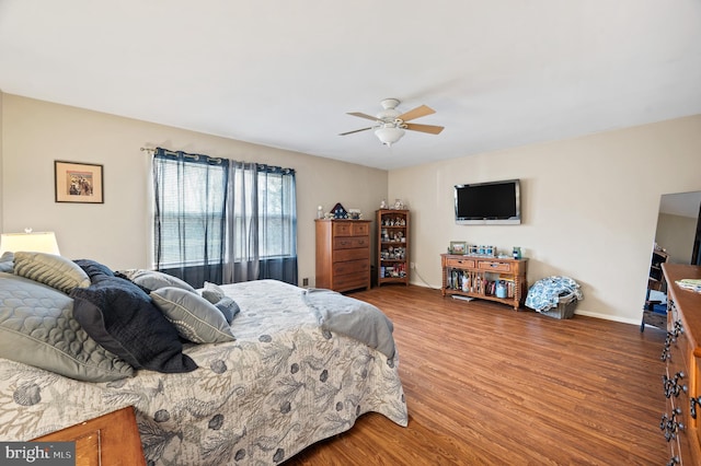 bedroom featuring ceiling fan and wood-type flooring