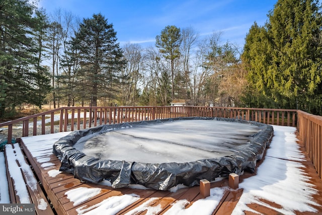 view of snow covered deck