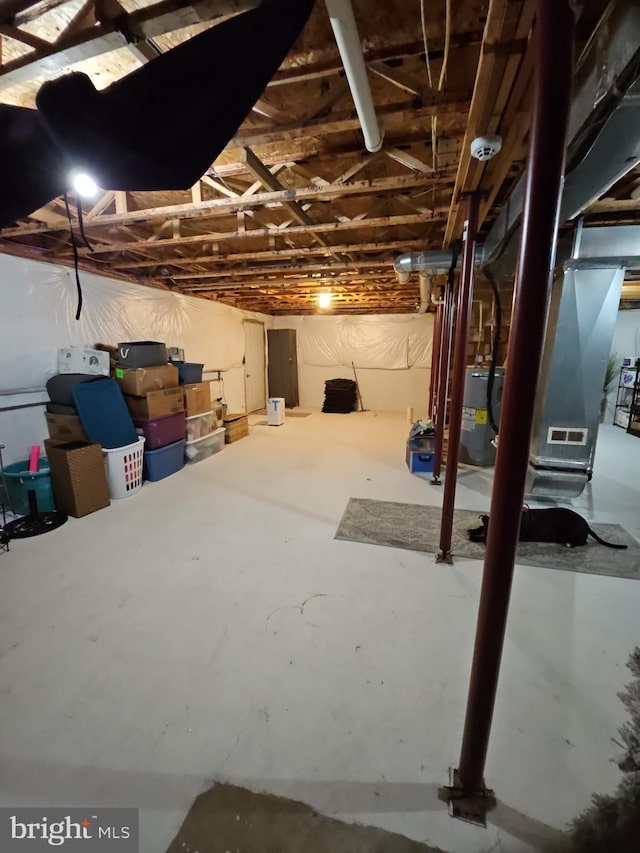 basement featuring water heater