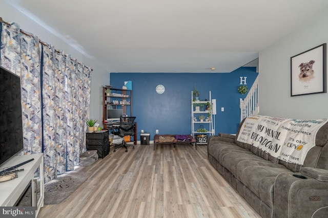 living room featuring light wood-type flooring