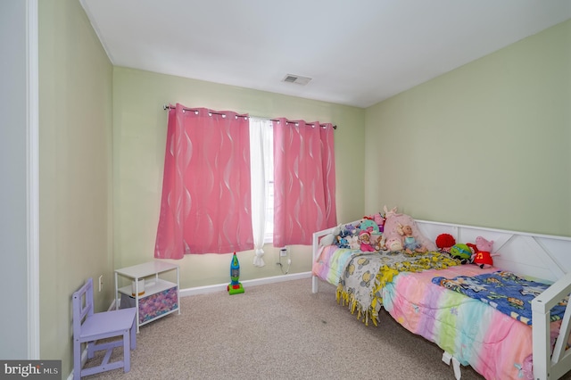 bedroom featuring carpet