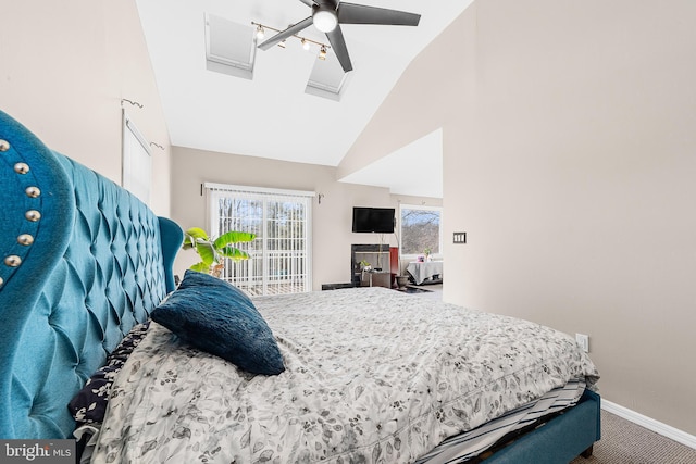 bedroom featuring vaulted ceiling, carpet floors, and ceiling fan