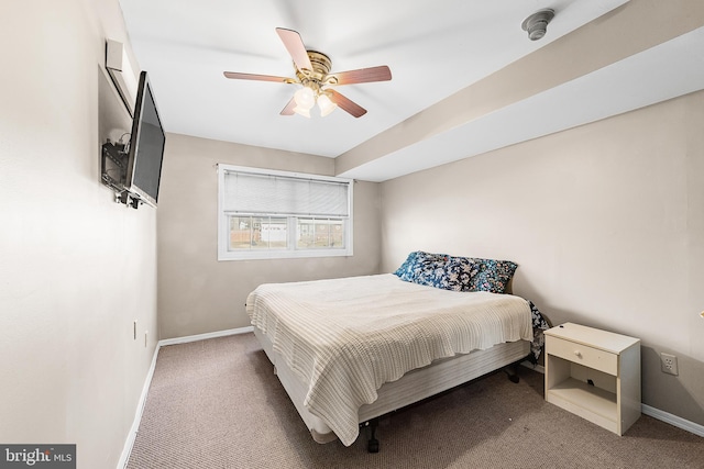 bedroom with ceiling fan and carpet