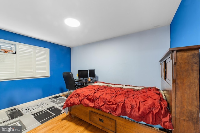 bedroom featuring hardwood / wood-style floors