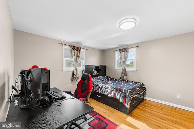 bedroom featuring hardwood / wood-style floors