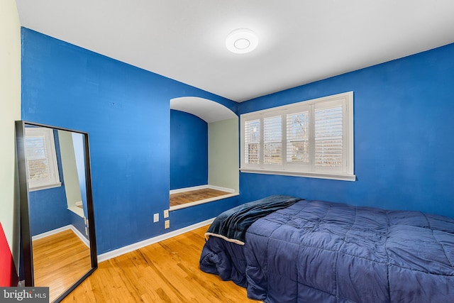 bedroom featuring hardwood / wood-style flooring