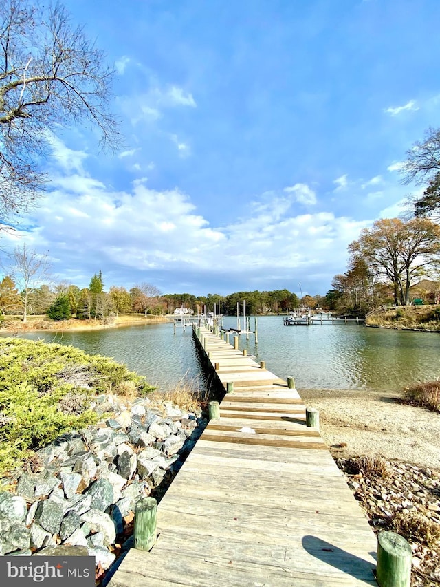 view of dock with a water view