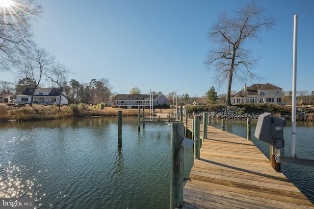 dock area featuring a water view