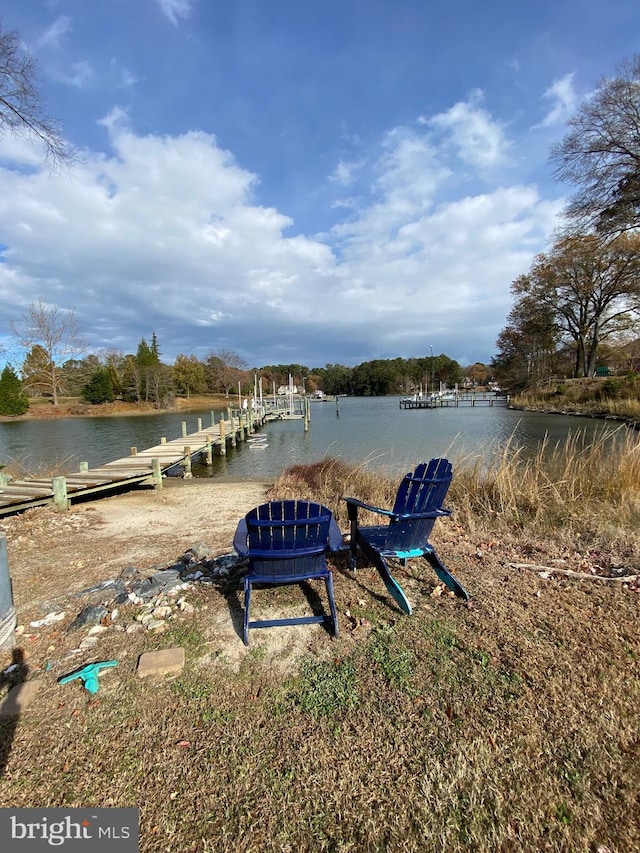 view of dock with a water view