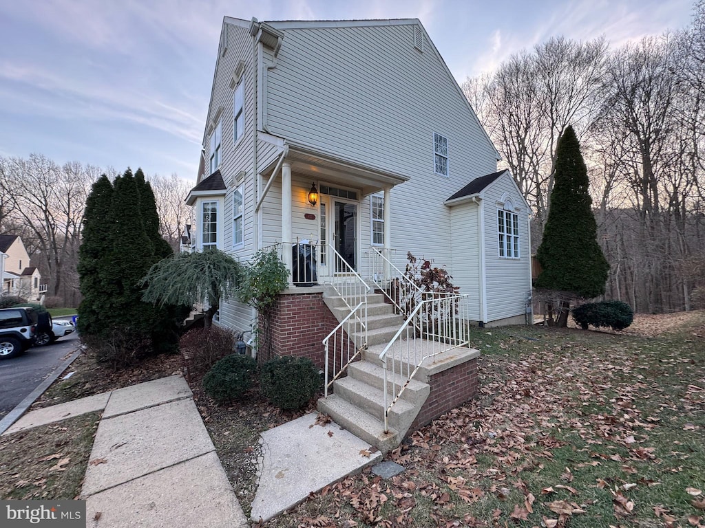 view of property with covered porch