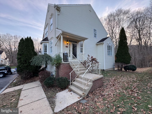 view of property with covered porch