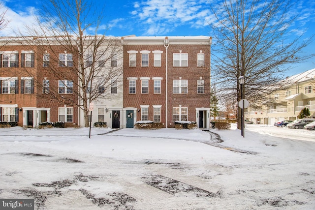 view of snow covered property