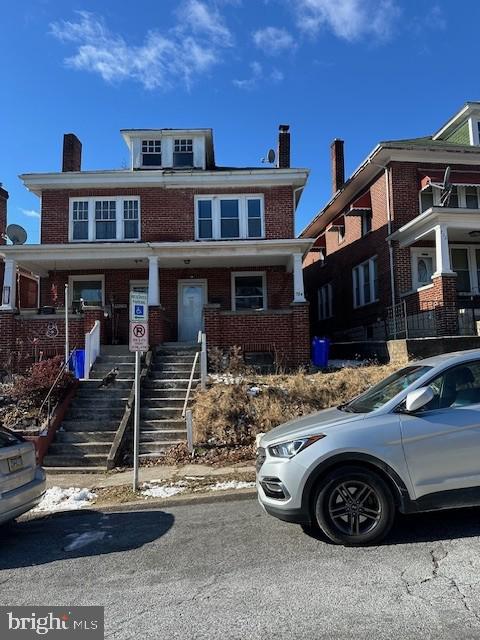 view of front of home featuring covered porch