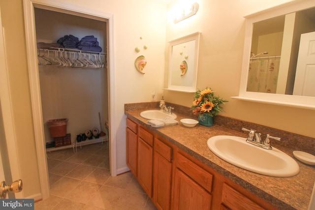 bathroom with vanity and tile patterned floors