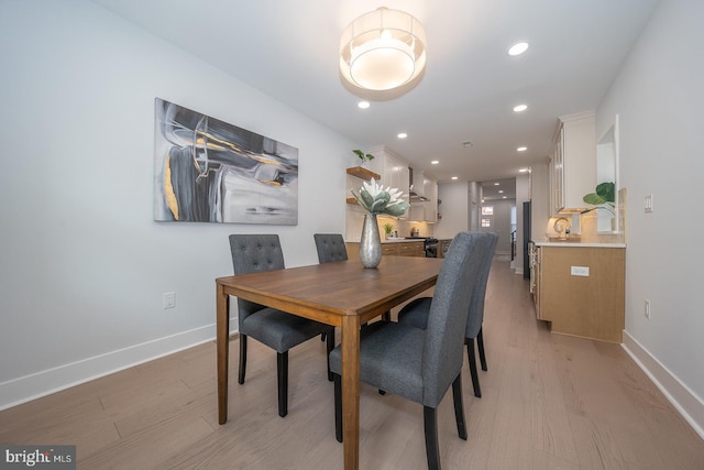 dining room featuring light wood-type flooring