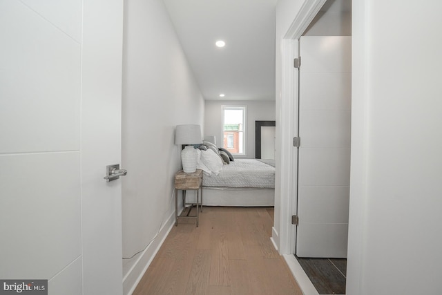 corridor featuring hardwood / wood-style flooring