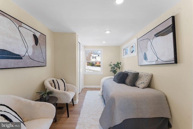 bedroom with light wood-type flooring