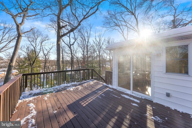 view of snow covered deck