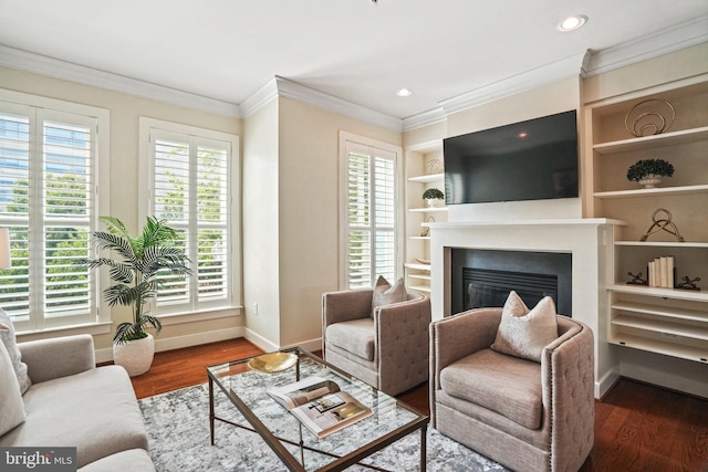 living room featuring plenty of natural light and hardwood / wood-style flooring