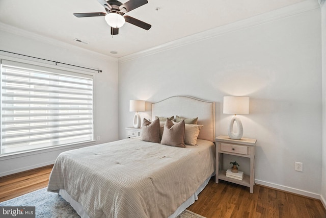 bedroom with ceiling fan, dark hardwood / wood-style flooring, and ornamental molding