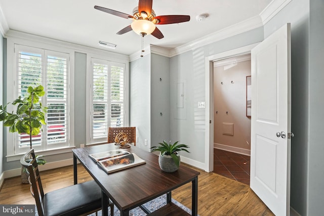 home office with hardwood / wood-style flooring, ceiling fan, and crown molding