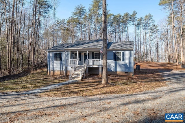 ranch-style house with cooling unit and covered porch