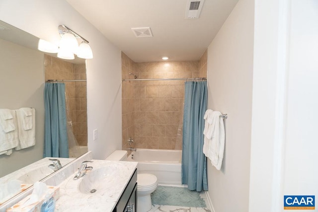 full bathroom with shower / tub combo, vanity, and toilet