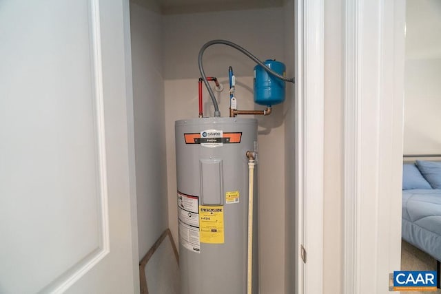 utility room with water heater