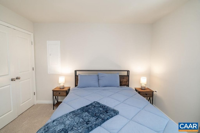 carpeted bedroom with a closet