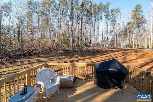 wooden deck featuring grilling area